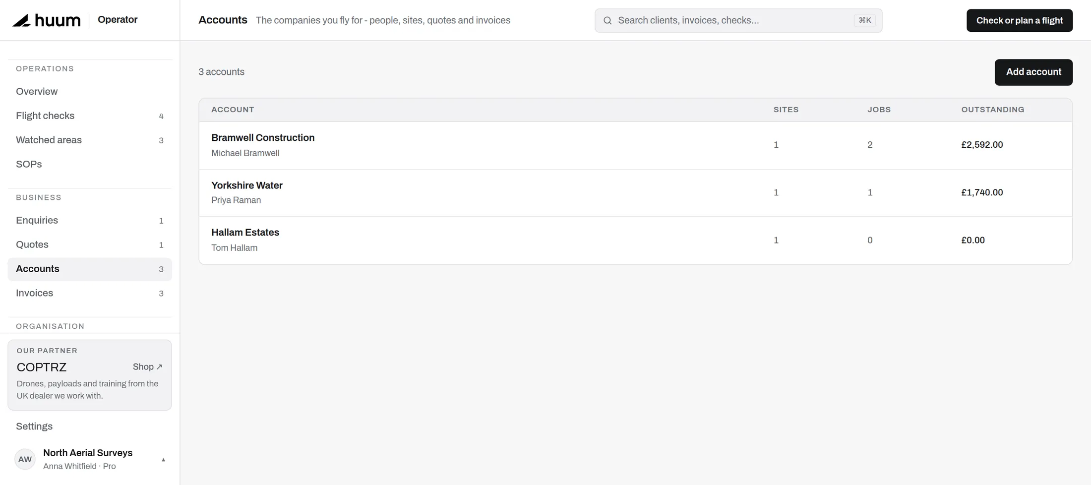 The accounts list showing three client companies with sites, jobs and outstanding balances